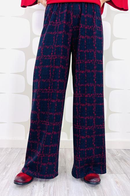 Pantalone sartoriale linea dritta a palazzo e tasche  latereali fantasia quadratoni rossi su base blu